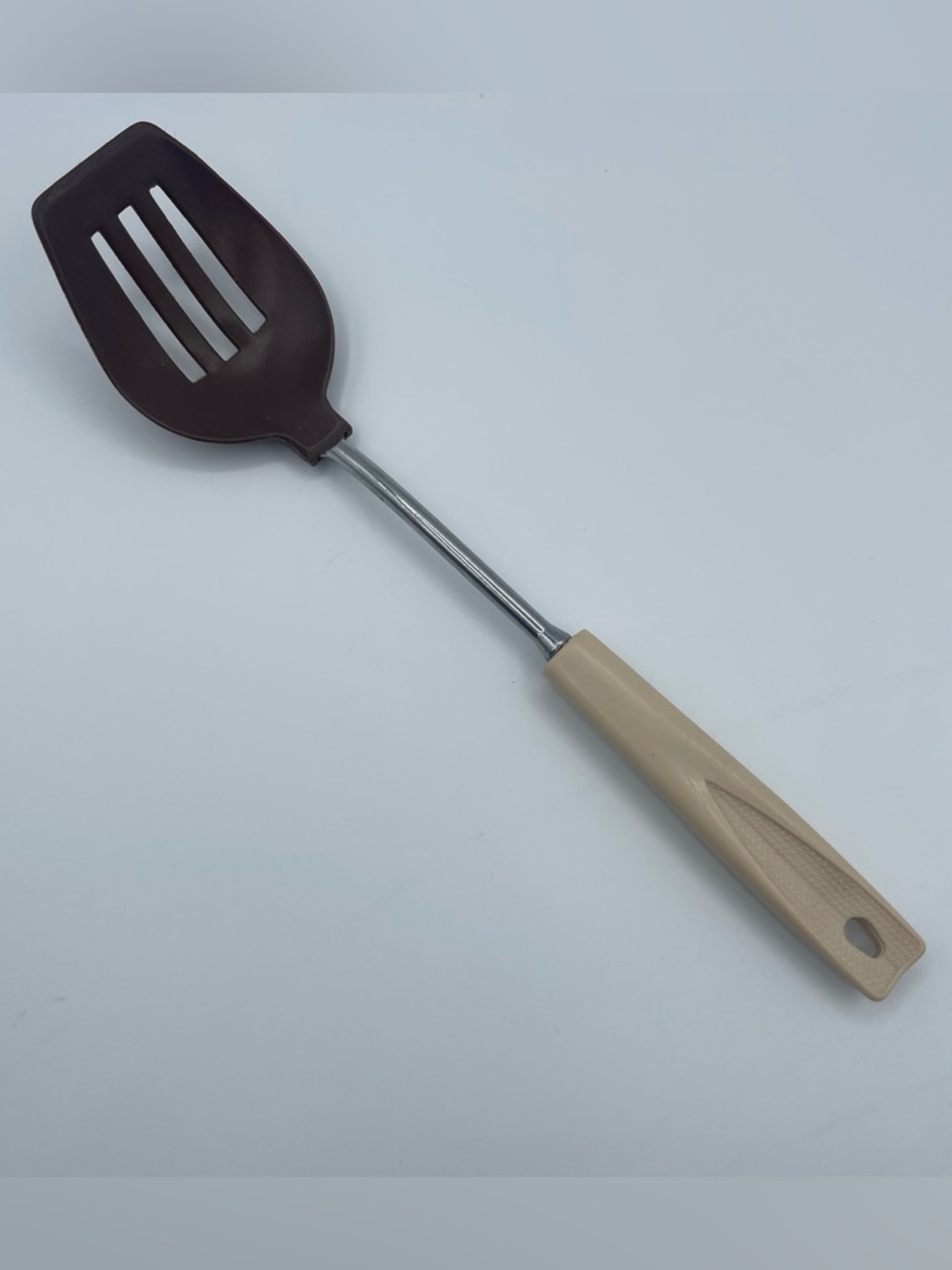 Vintage brown cream Ekco Nylon Slotted Spoon made in USA excellent condition